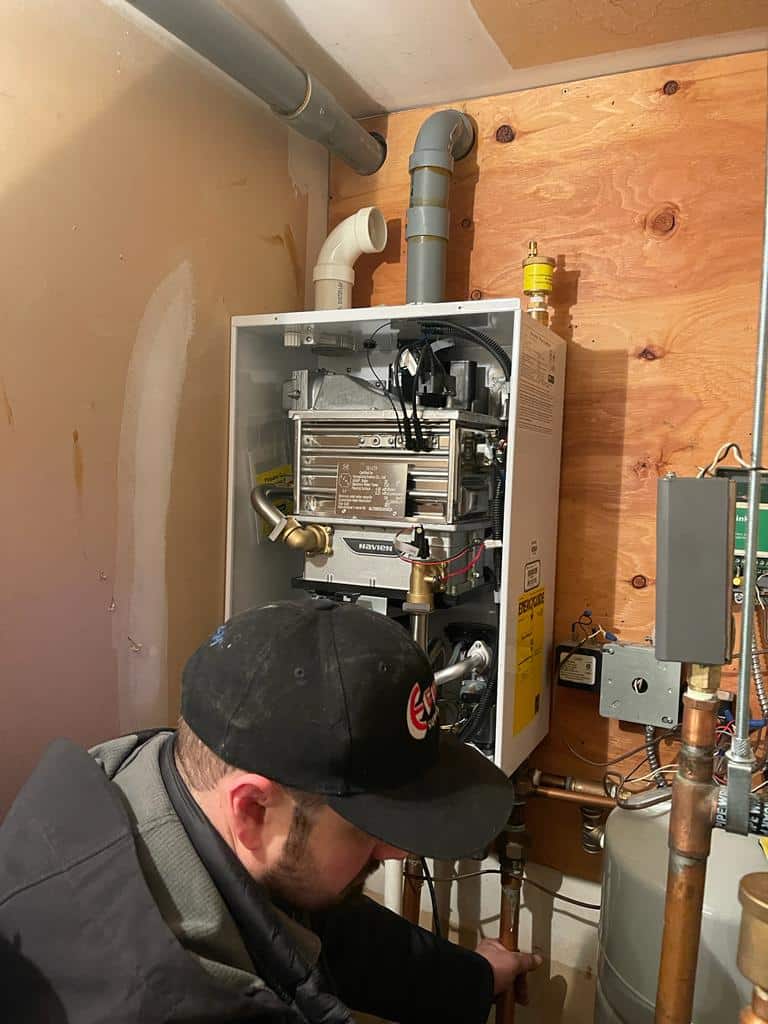 A man is doing boiler repair service in Vancouver